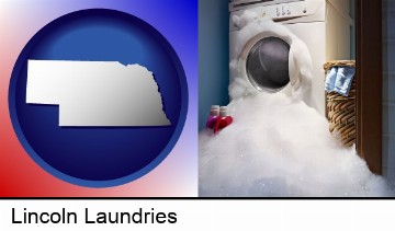 a washing machine with overflowing soap suds in a laundry in Lincoln, NE