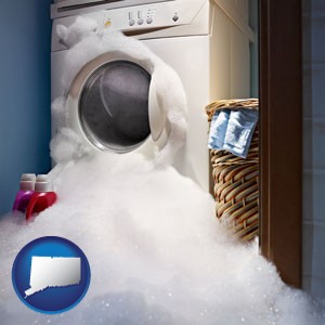 a washing machine with overflowing soap suds in a laundry - with Connecticut icon